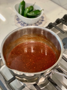 chile sauce cooking on stove
